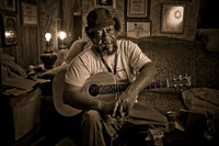 portrait of Willie King, blues musician from Old Memphis in Pickens County Alabama. First guitar was improvised by fastening bailing wire to a broom handle. He was the subject of a Dutch documentary film Down in the Woods