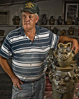 portrait of Jerry Brown of Hamilton, Alabama. He is a ninth generation potter. He makes primarily utilitarian forms such as jugs, churns, and bowls, as well as face jugs and other figural forms.